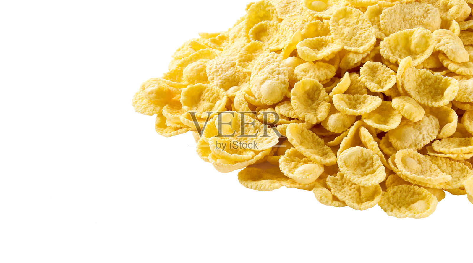 白色背景上的玉米片特写,新鲜健康的早餐概念。照片摄影图片