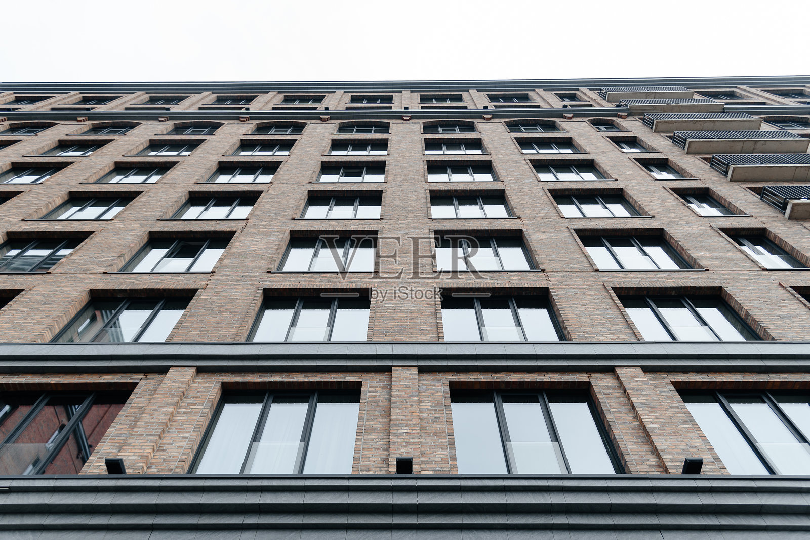 现代多层砖砌公寓大楼照片摄影图片