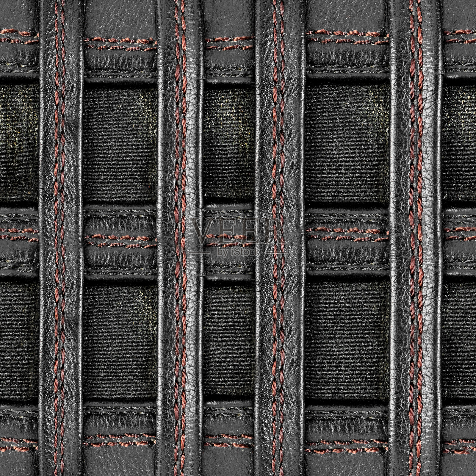 无缝4K照片纹理材料,黑色缝合带皮革网状物,放置在脏布上。照片摄影图片