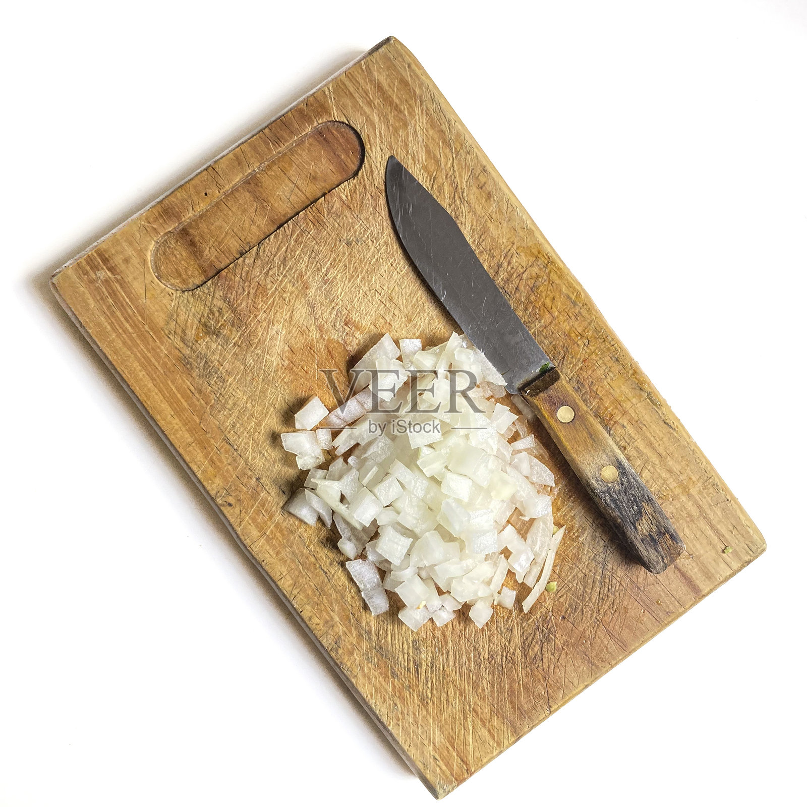 切菜板上切好的白洋葱照片摄影图片