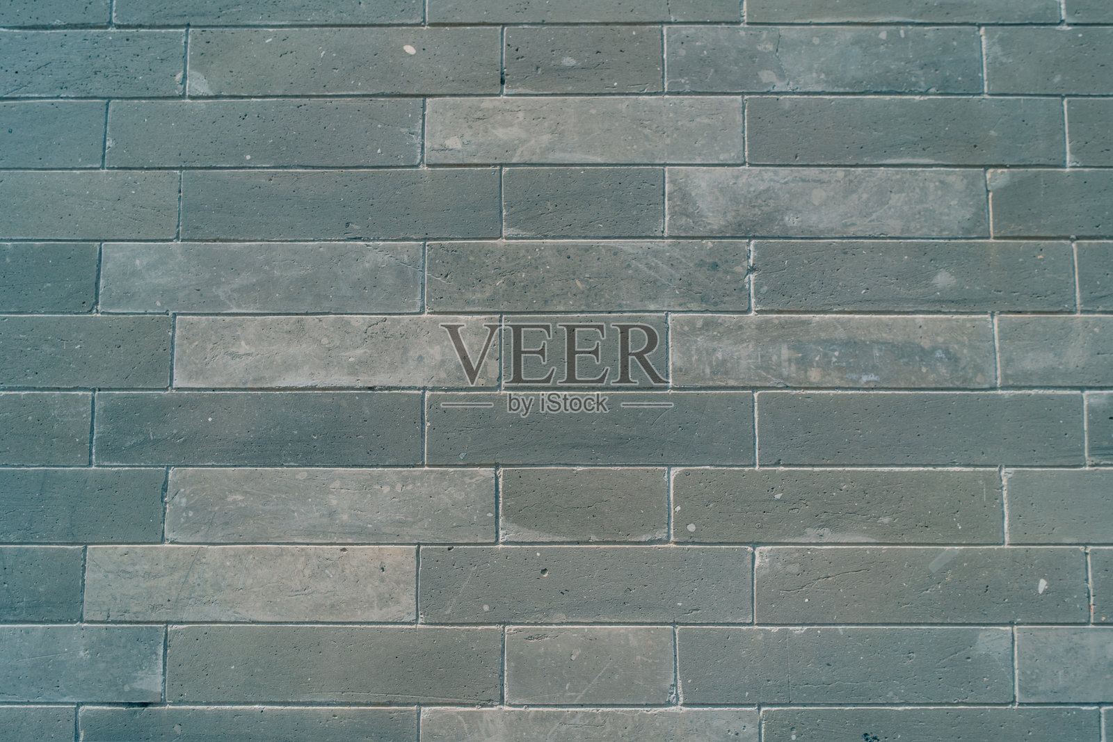 中国民居的灰色砖墙。照片摄影图片