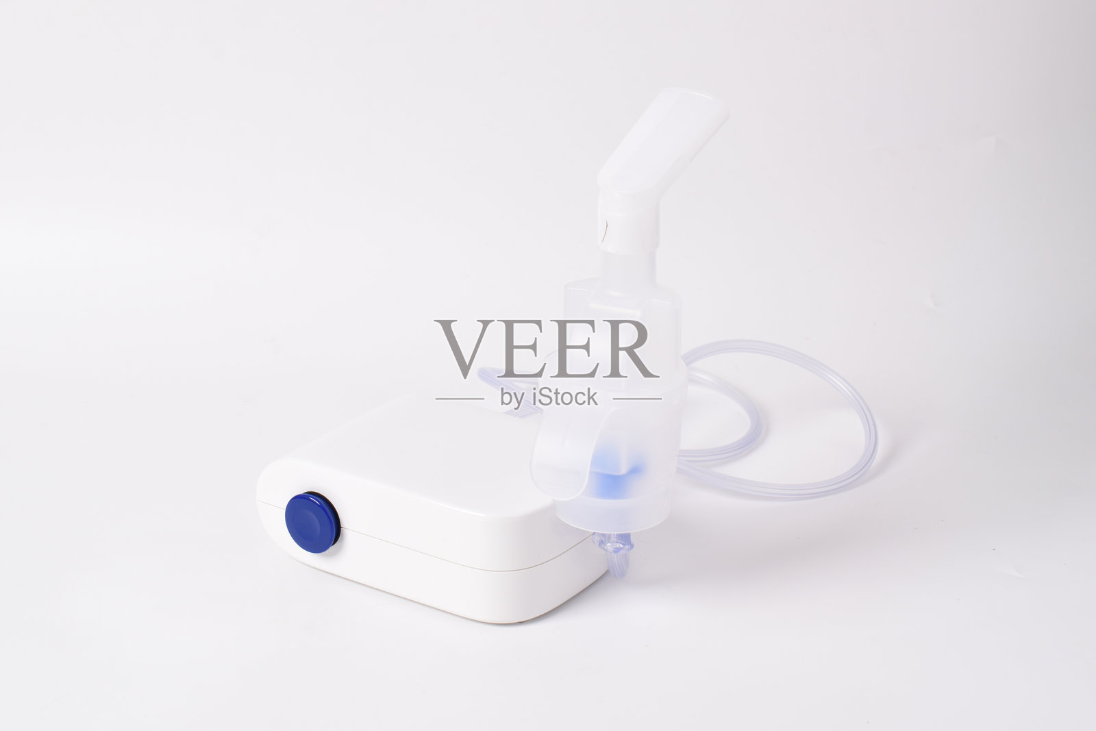 压缩雾化器,带嘴部的雾化杯照片摄影图片