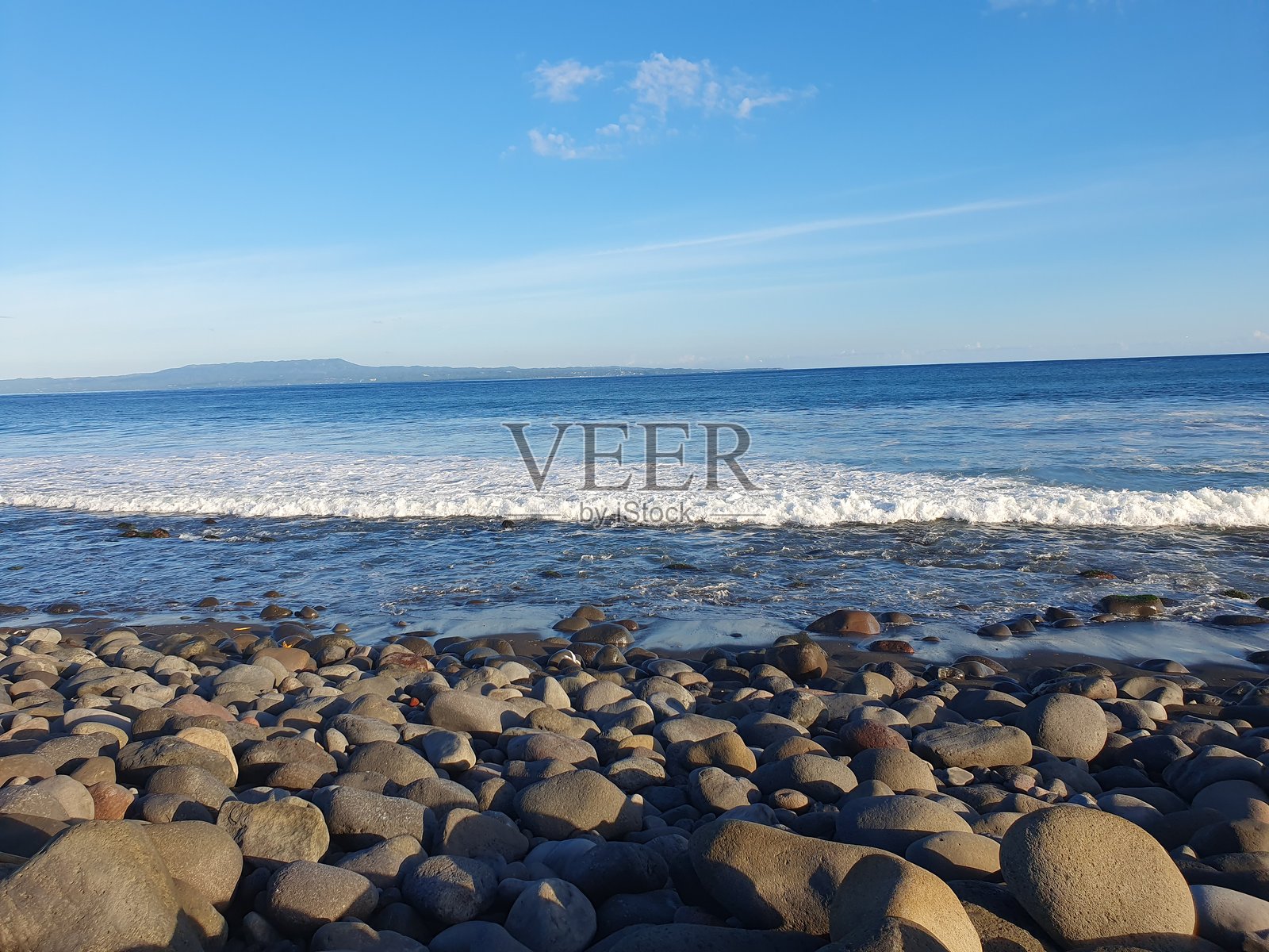 巴厘岛的大石头和海洋照片摄影图片