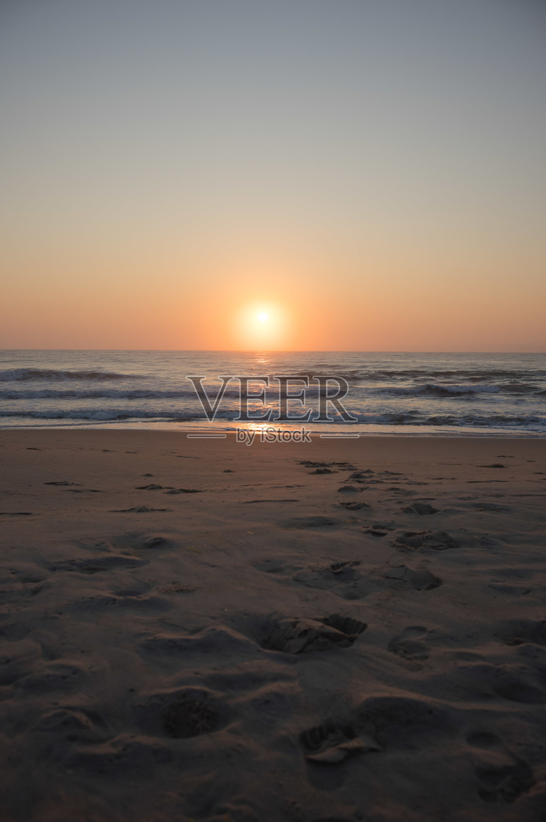 海滩日出照片摄影图片