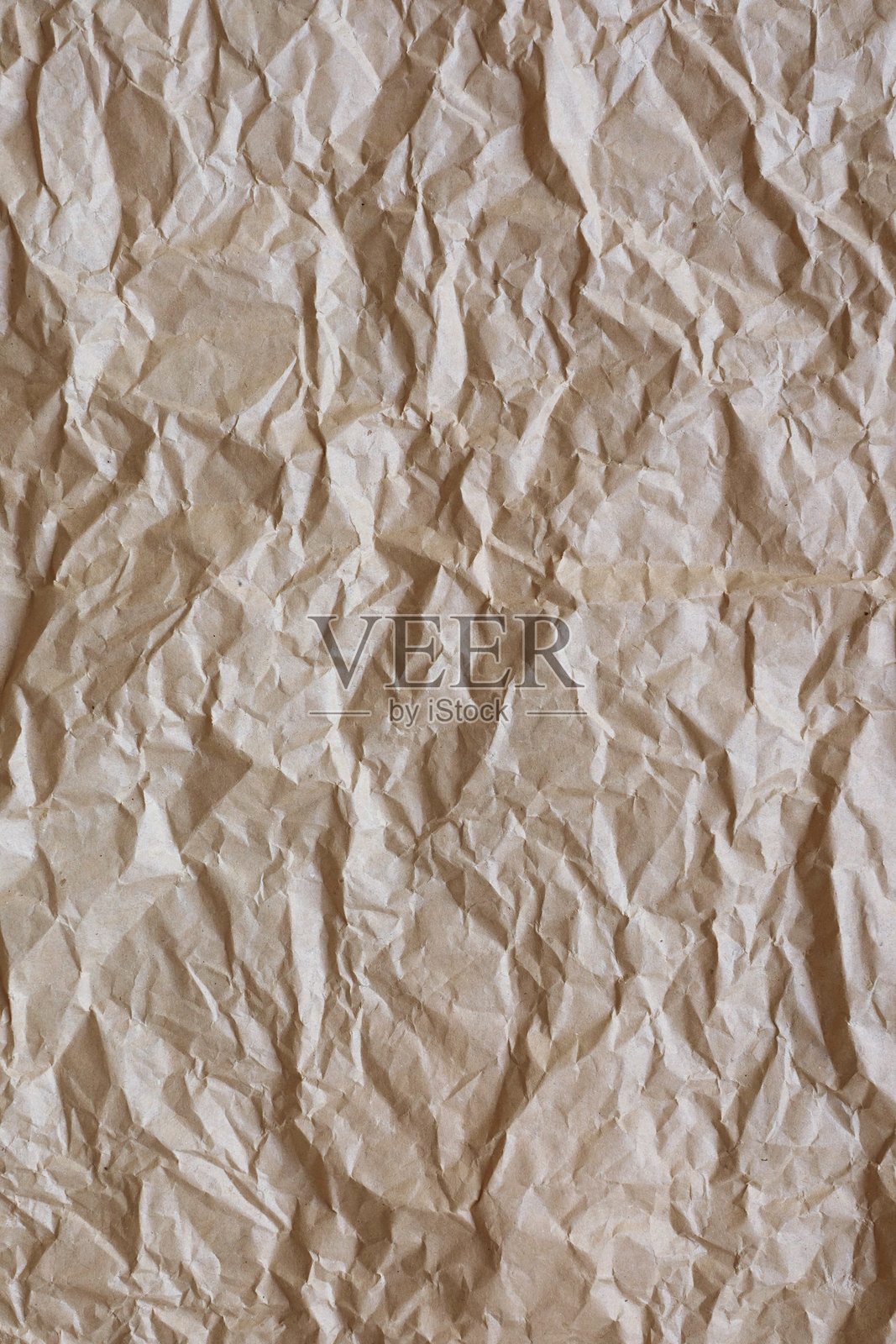 皱褶的棕色纸张为设计项目创造了有纹理的背景照片摄影图片