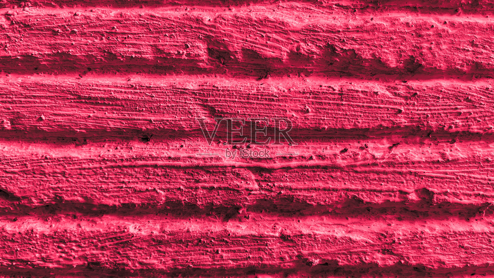 粗糙墙面纹理的特写视图,具有自然的线条和细节,适合用作背景或材料设计。照片摄影图片