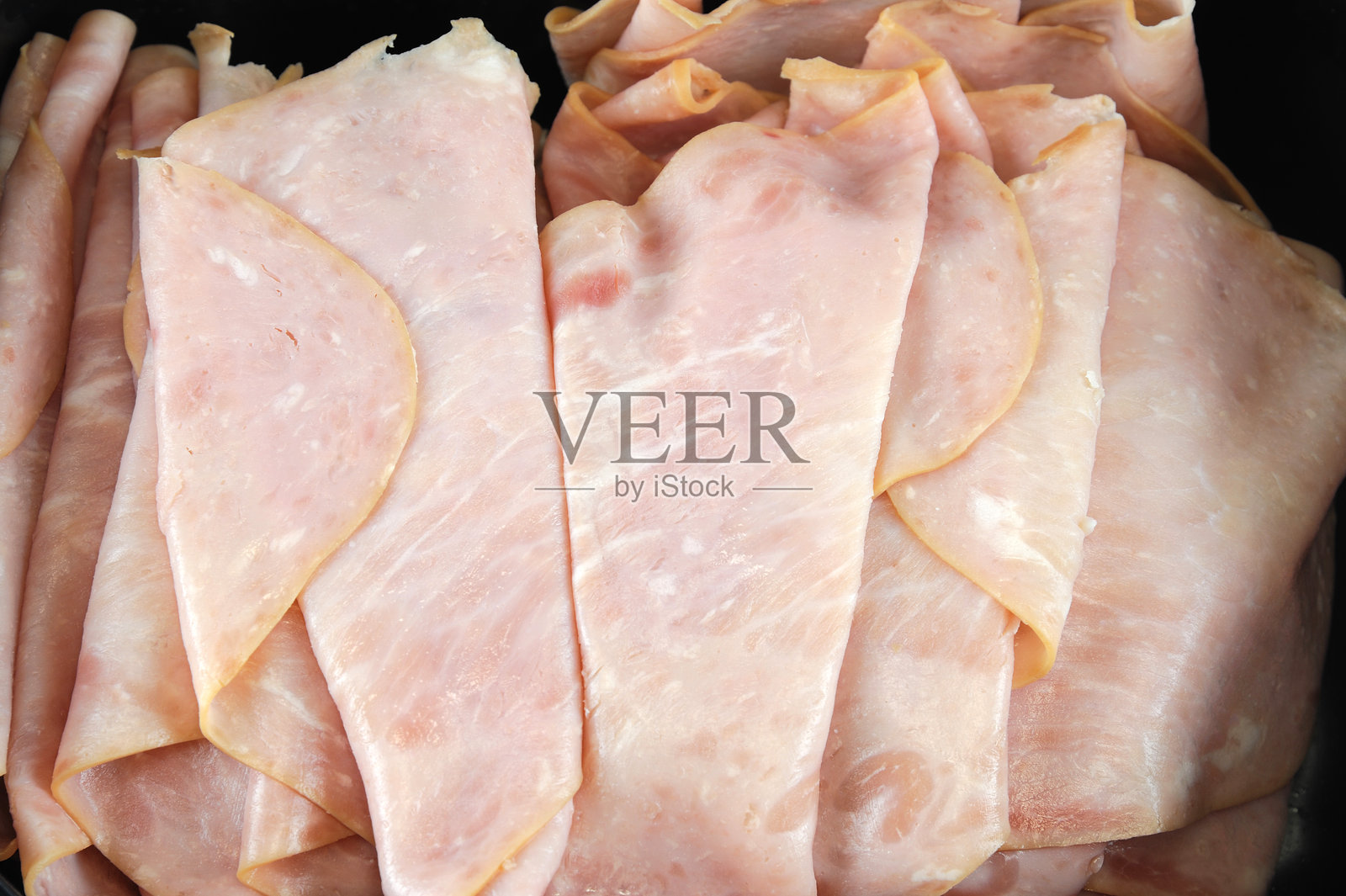 新鲜切片的蜜汁火腿特写照片摄影图片