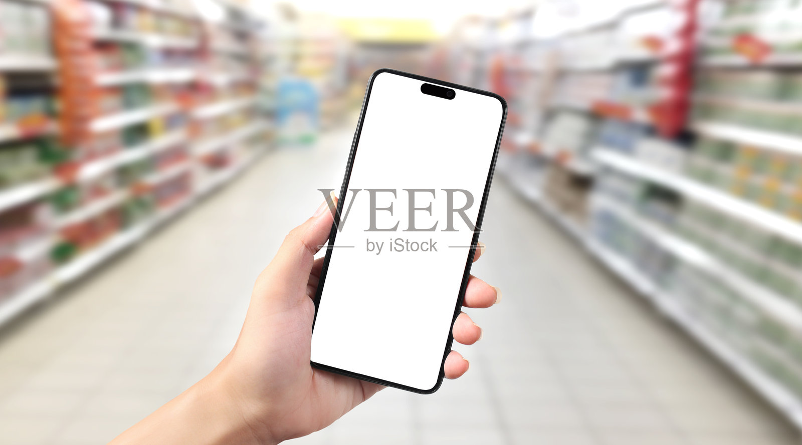 手握智能手机并触摸屏幕照片摄影图片