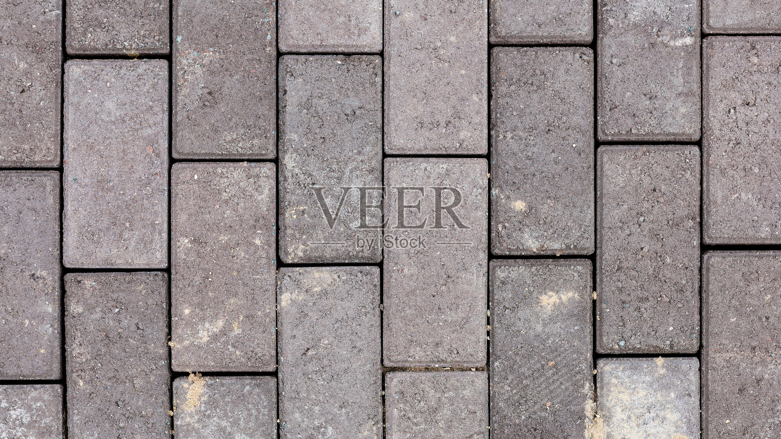 特写鸟瞰装饰性铺路石,展示独特的图案和纹理,适用于城市景观和户外设计照片摄影图片