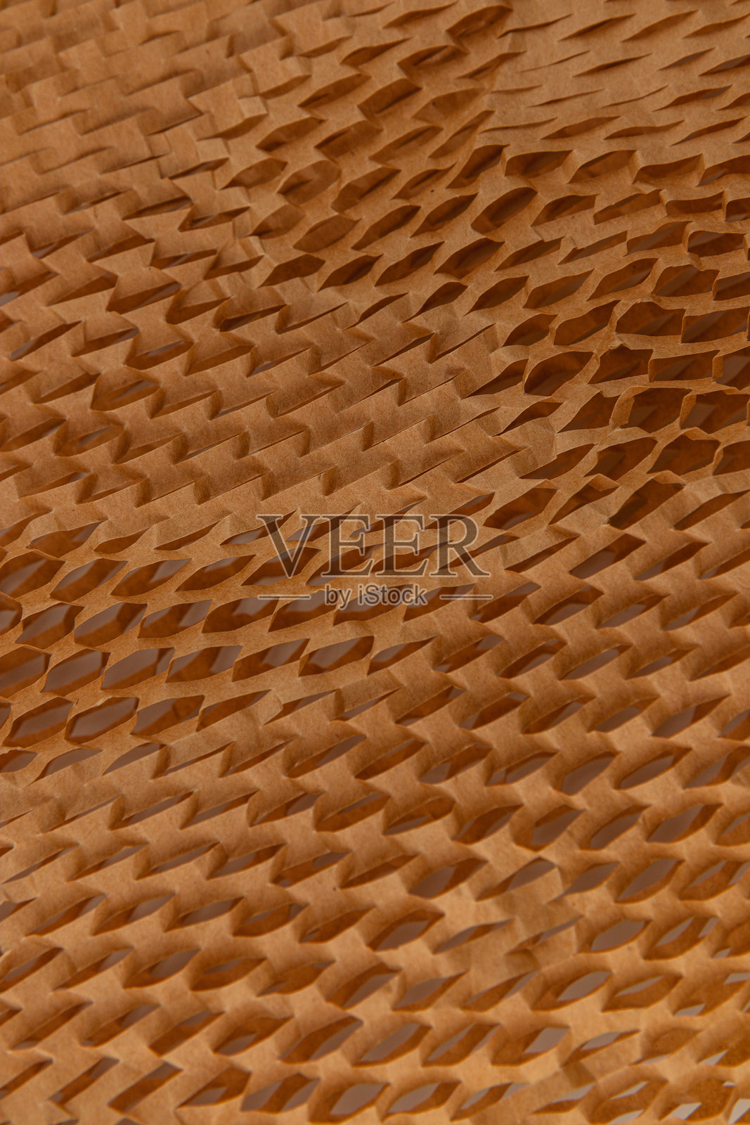 类似鳞片的编织纸质感图案,呈平面状。照片摄影图片