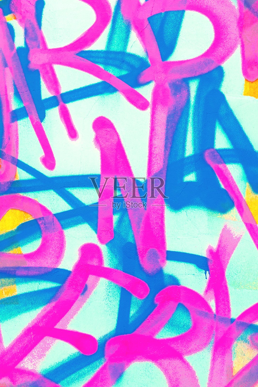 霓虹粉和青色组成的充满活力的涂鸦艺术,适合90年代和Y2K风格的城市风貌照片摄影图片