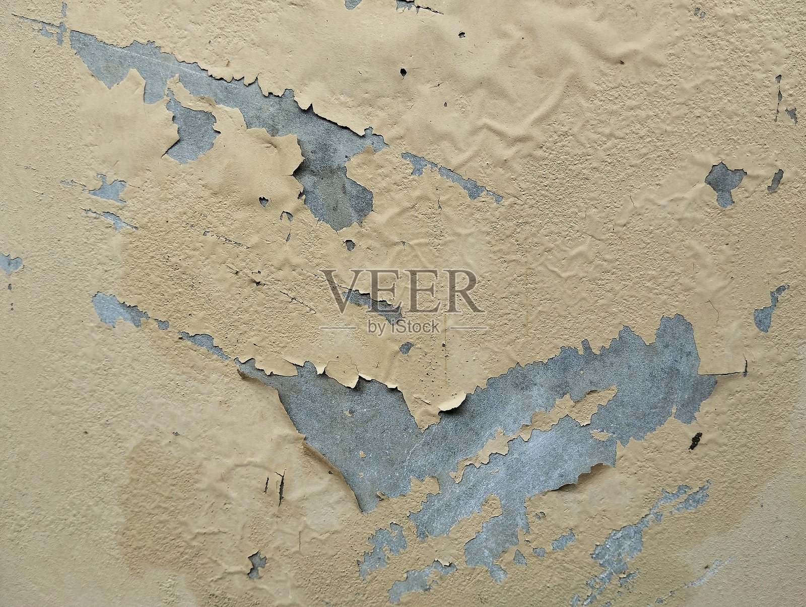 特写镜头下剥落油漆的旧墙,具有风化纹理的背景照片摄影图片