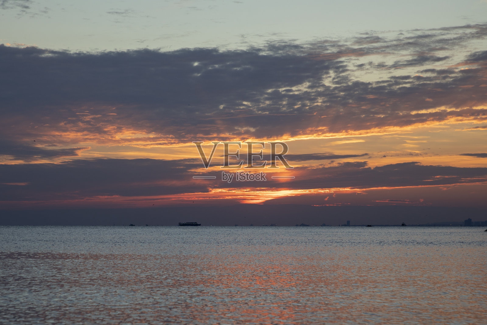 日落与大海的绝美景色照片摄影图片