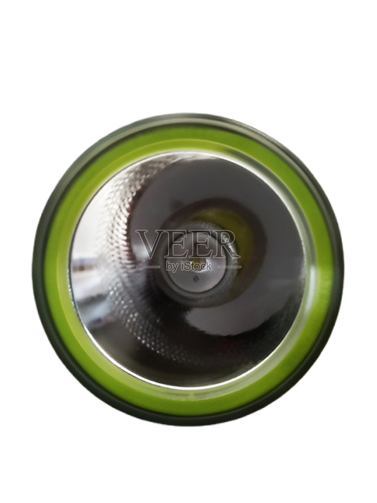 LED手电筒正面特写,带有反射镜和绿色光圈照片摄影图片