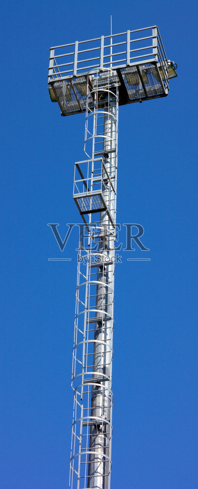 白天的灯光塔照片摄影图片