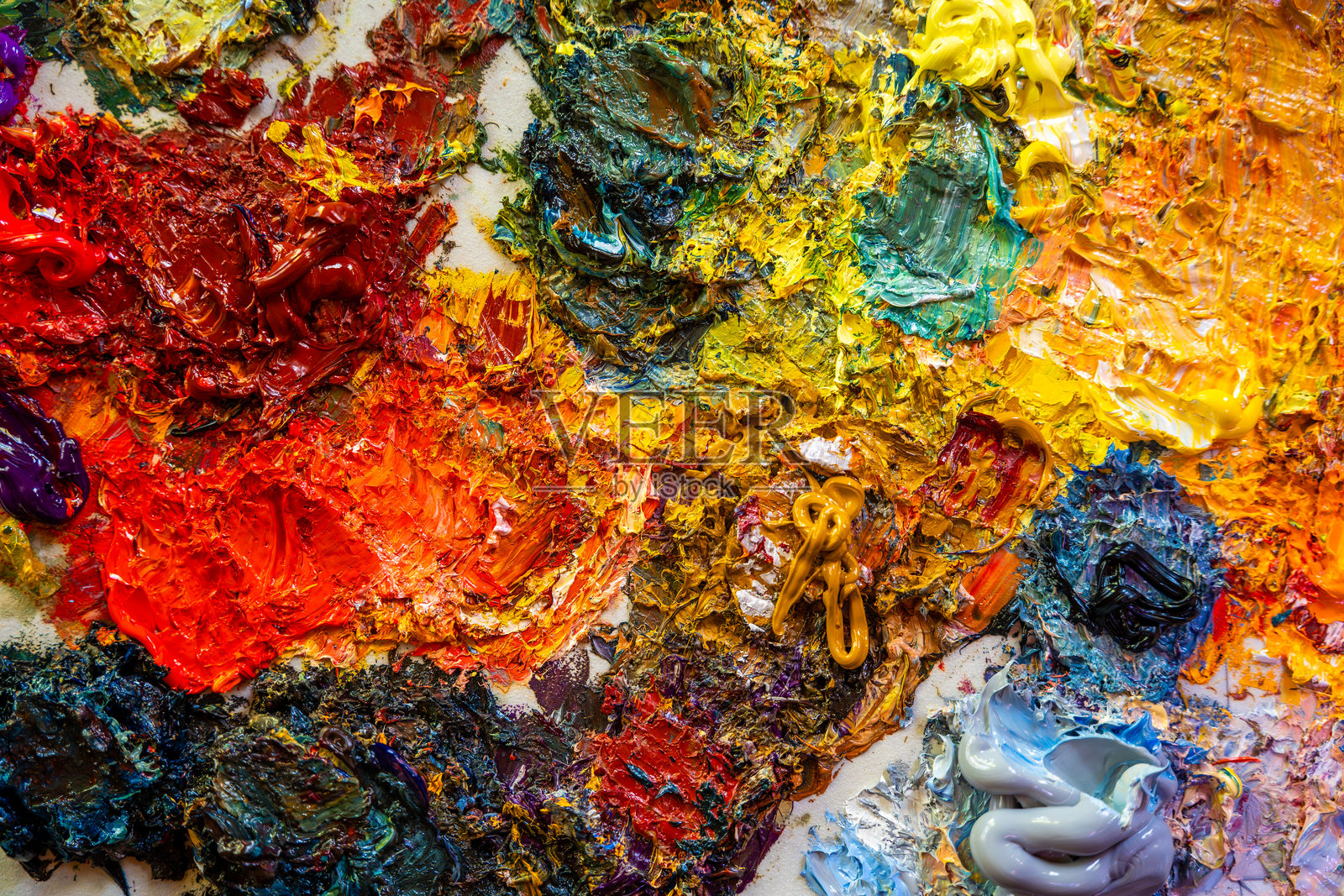 厚重纹理油画颜料的调色板特写。抽象艺术与创意灵感。照片摄影图片