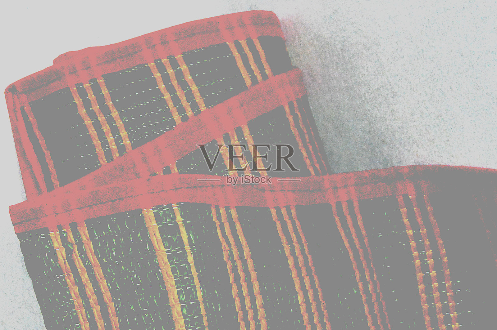 红色格子纺织品特写,带有编织条纹,适用于家居装饰和工艺项目照片摄影图片