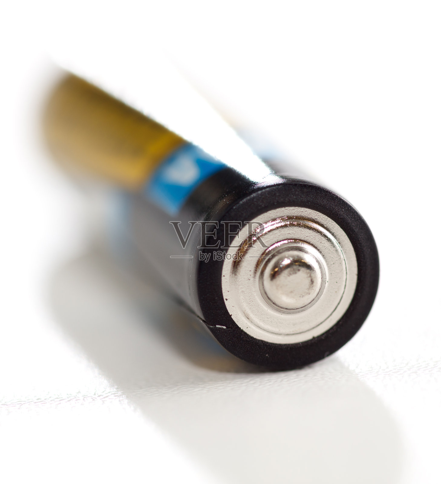 一个电池,顶部是银色的照片摄影图片