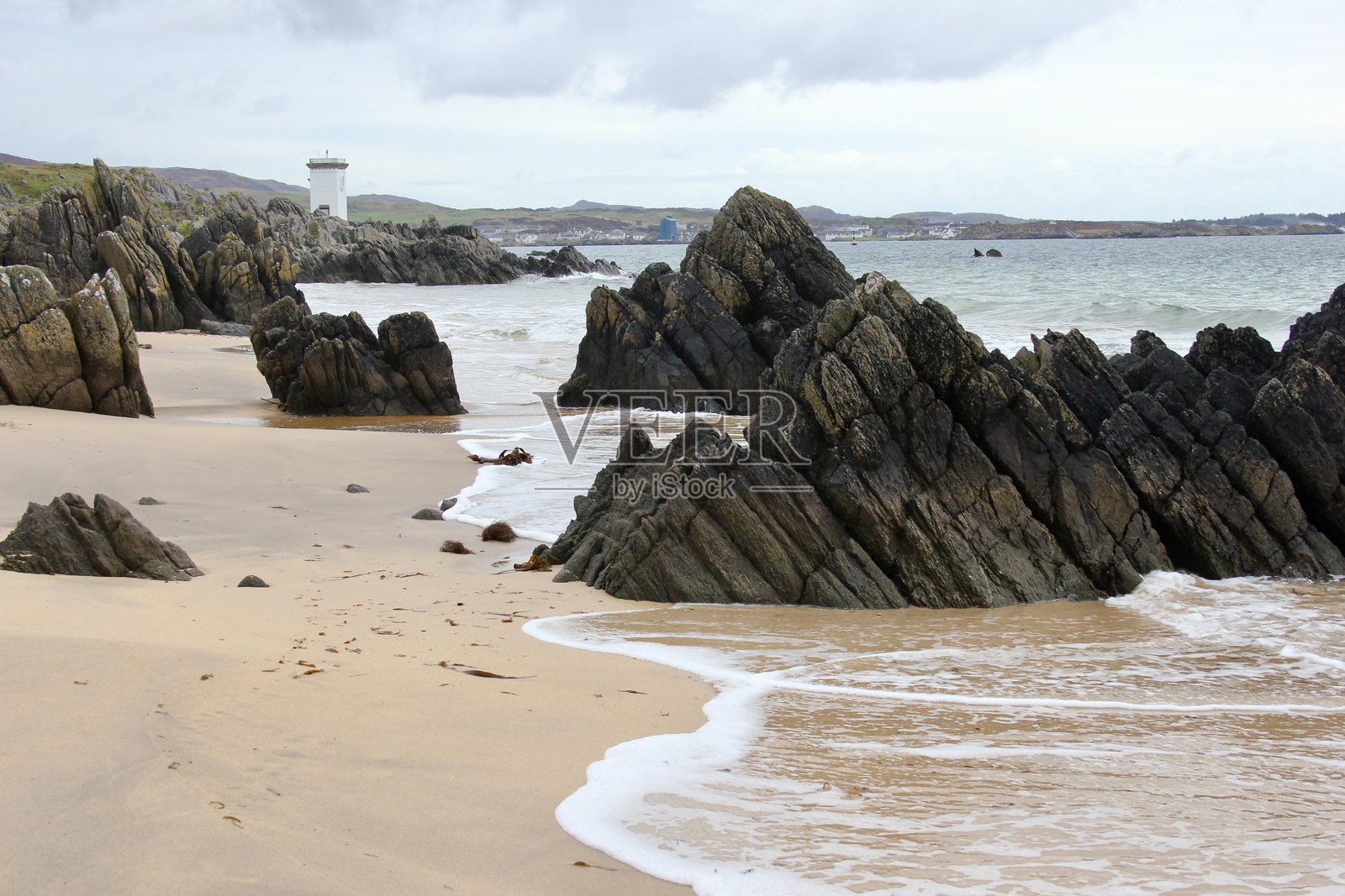 吟唱的沙滩与灯塔,艾拉岛照片摄影图片
