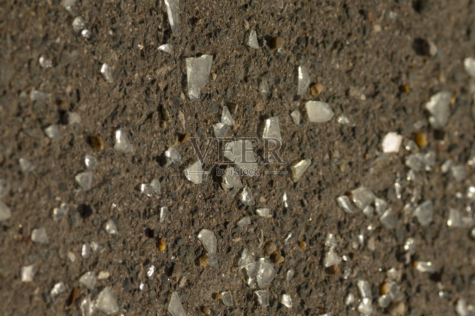 许多小石子组成的混凝土表面的特写照片摄影图片