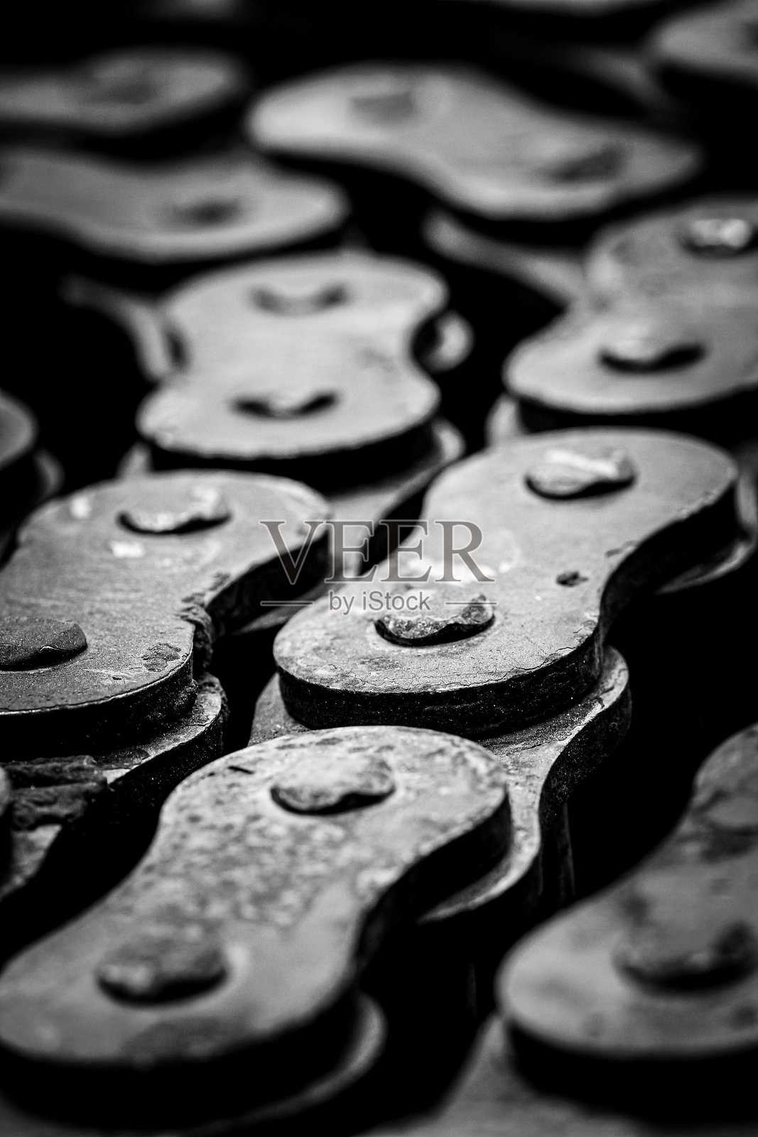 垂直排列的工业链照片摄影图片