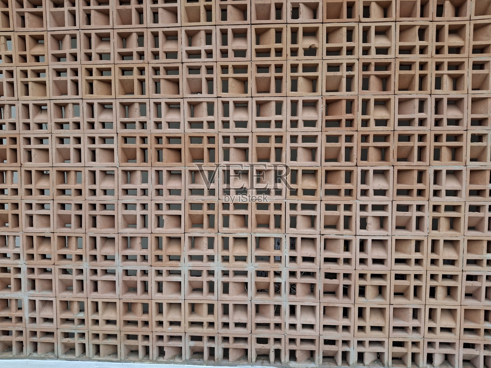 一种由称为“roster”或“loster”的建筑材料制成的墙壁,roster或loster墙壁的背景照片摄影图片