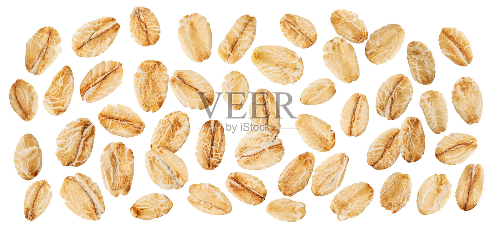 悬浮的燕麦片,孤立在白色背景上。空气中飞舞的燕麦食品。燕麦卷合集。图案照片摄影图片