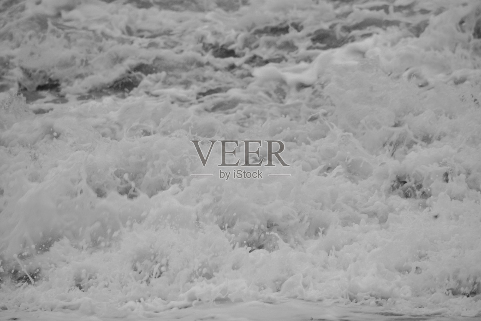 海浪拍打海岸的特写照片摄影图片