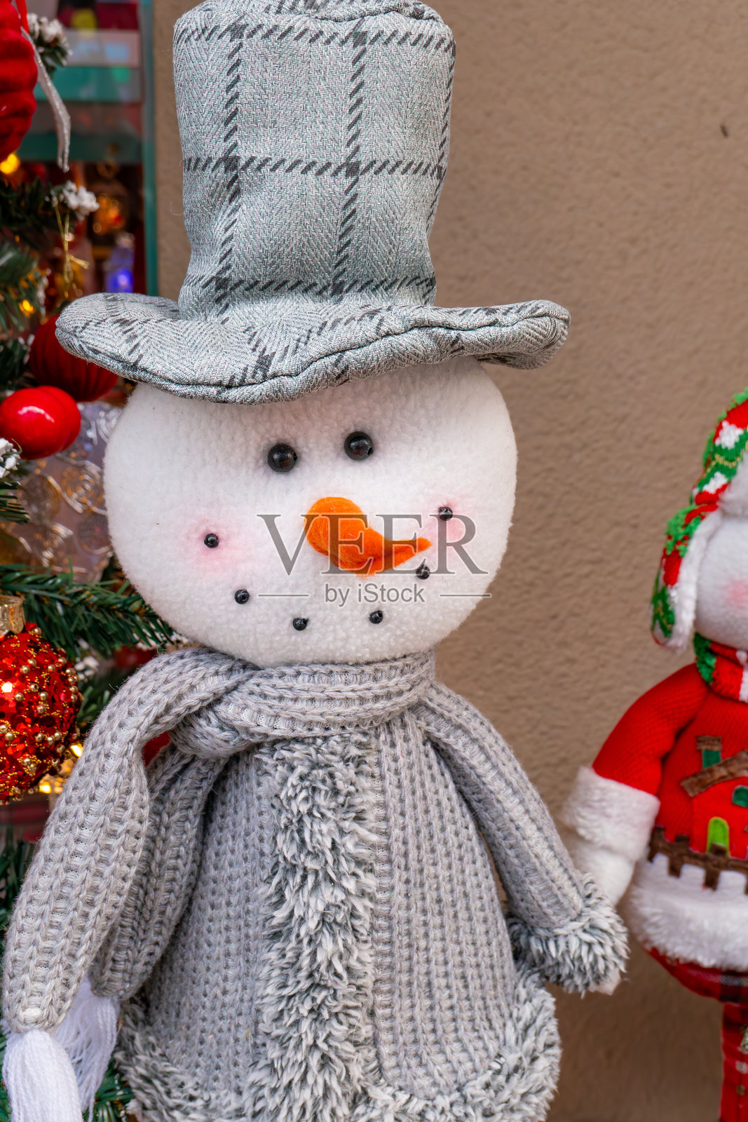 可爱的圣诞雪人在竖构图照片摄影图片