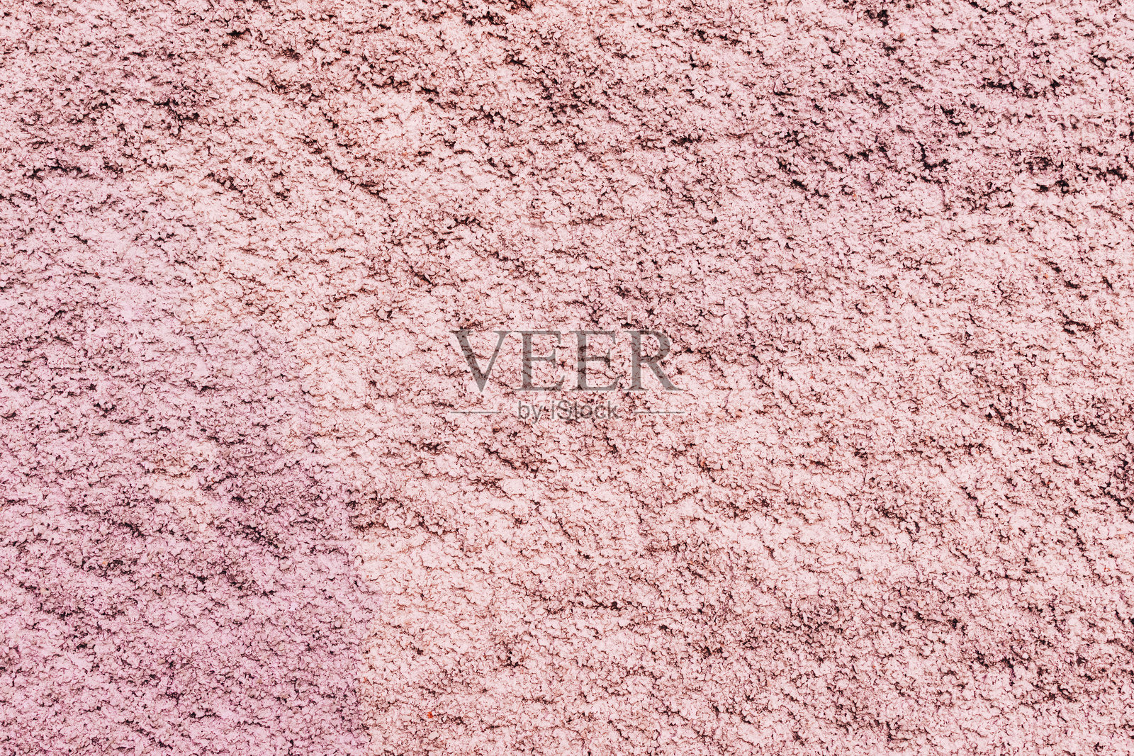 粗糙粉色哑光背景的绝美景致。照片摄影图片