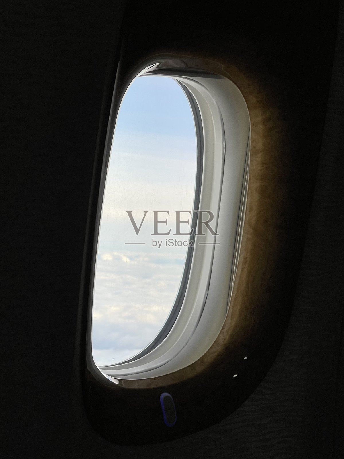 从飞机舷窗看到的云景照片摄影图片