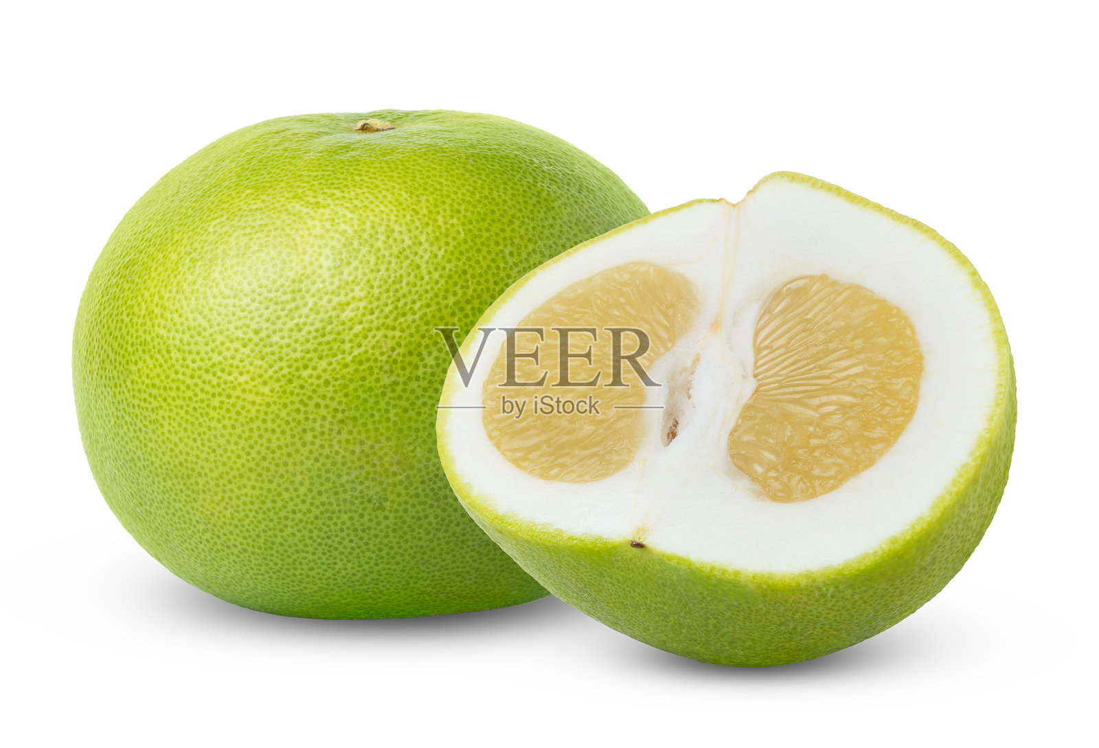 柑橘甜心,又名葡萄柚、金吉,是柚子的一种,半个被孤立。绿色的葡萄柚甜心,带有半个葡萄柚甜心,带有剪贴路径。照片摄影图片