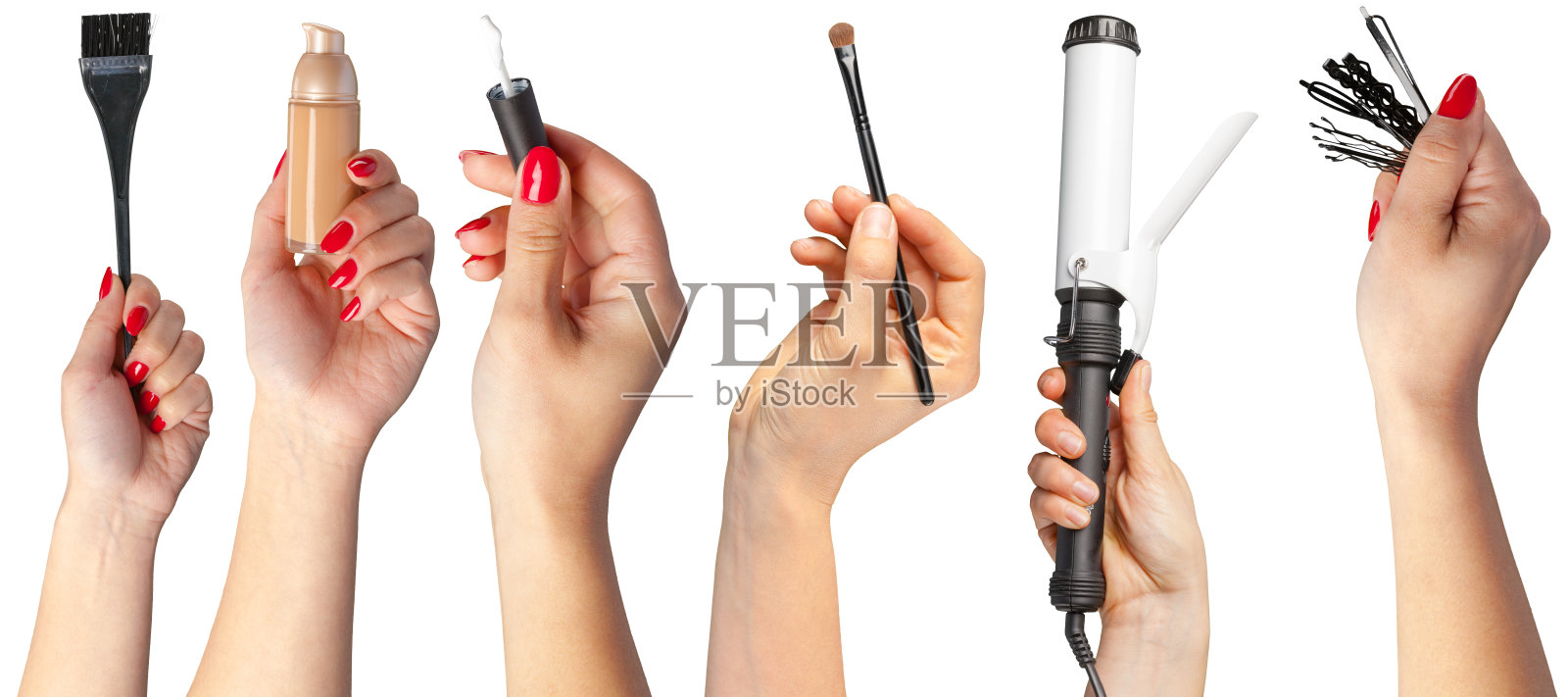 手展示各种美容工具和产品,用于化妆和发型设计照片摄影图片