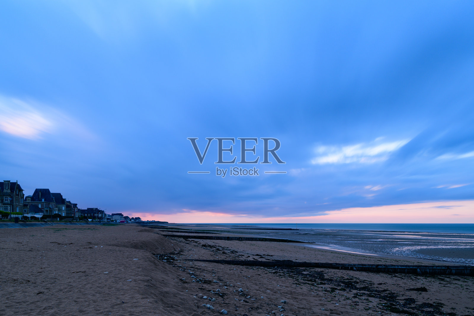 暮色下的剑滩海岸线照片摄影图片