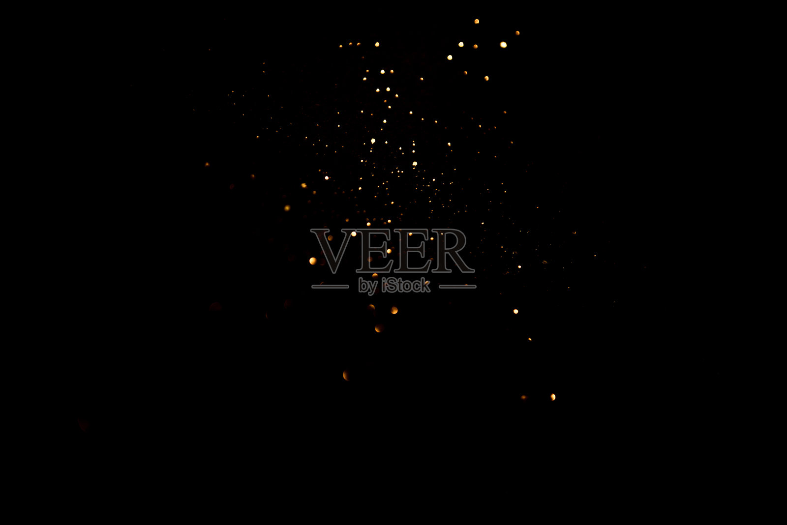 金色抽象散景在黑色背景上照片摄影图片