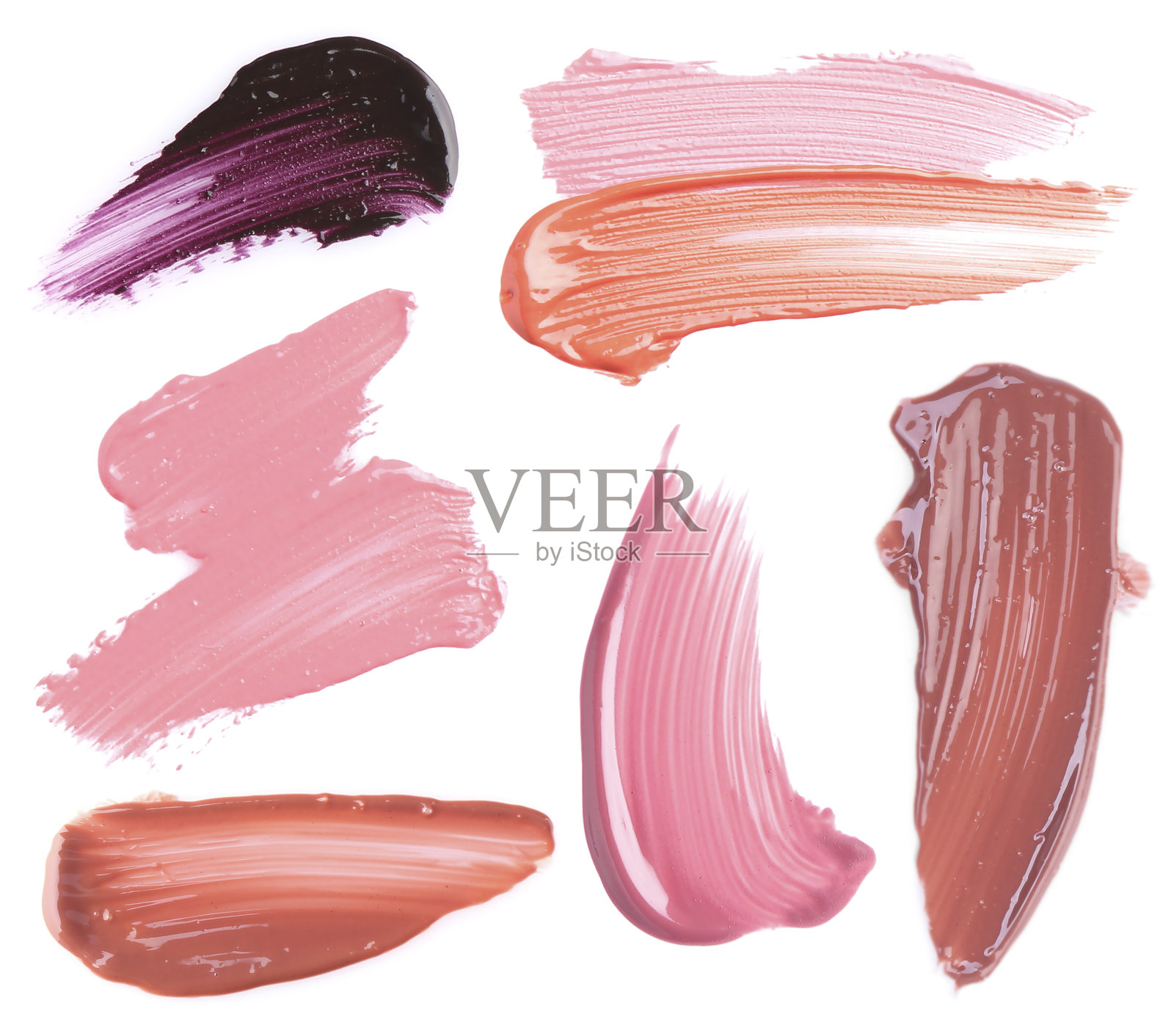 不同色调的唇彩在白色背景上,样品集照片摄影图片