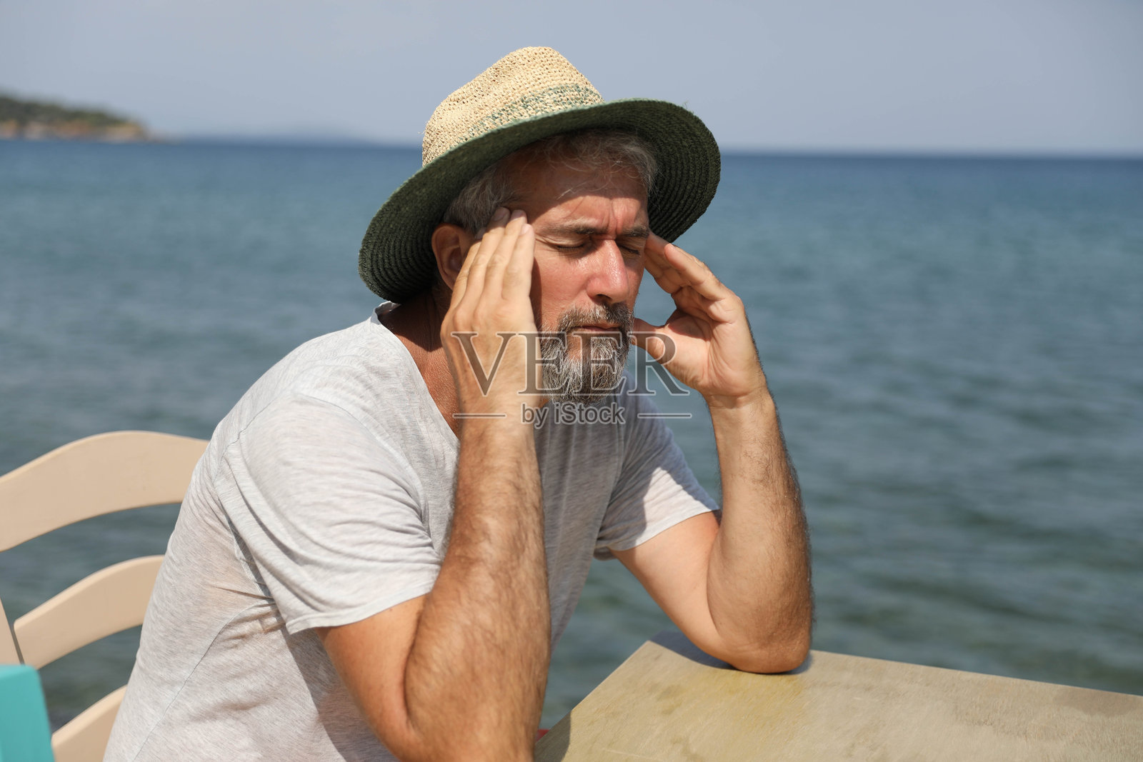 暑假头痛和精神疲劳照片摄影图片