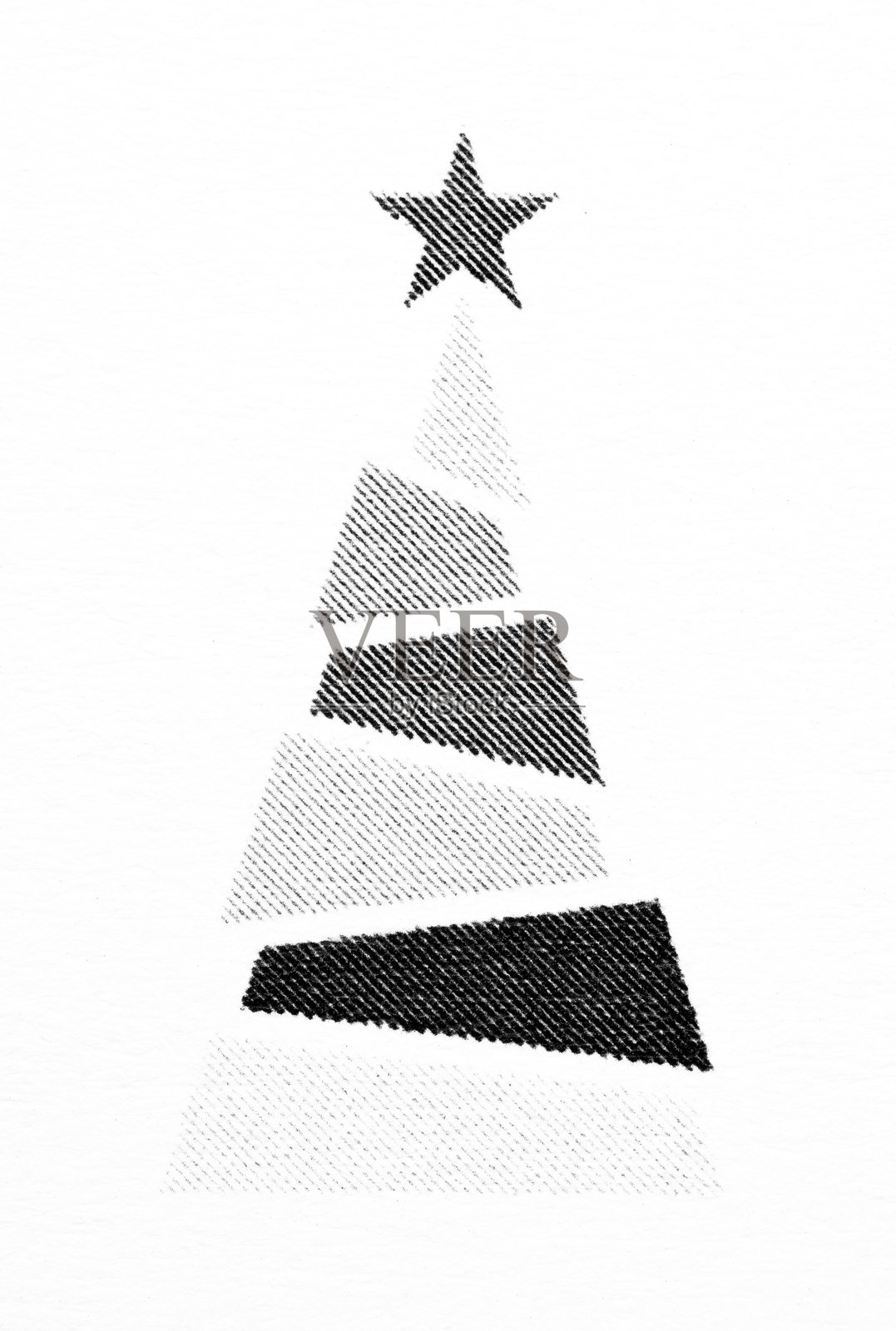 黑白风格的极简圣诞树微距特写,树顶有星星装饰照片摄影图片