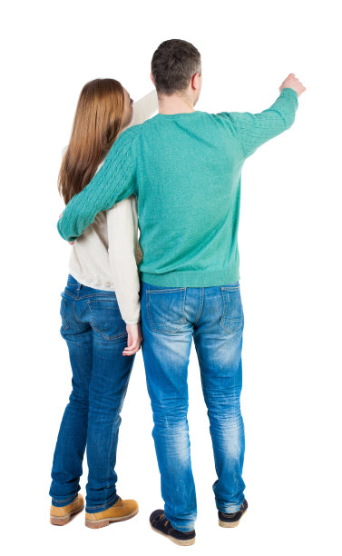 一对年轻夫妇指着沃尔后视图图片 一对年轻夫妇指着沃尔后视图图片下载