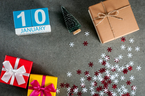 1月10日。图片10月1日,日历在圣诞节和快乐的新年背景与礼物图片 1月10日。图片10月1日,日历在圣诞节和快乐的新年背景与礼物图片下载