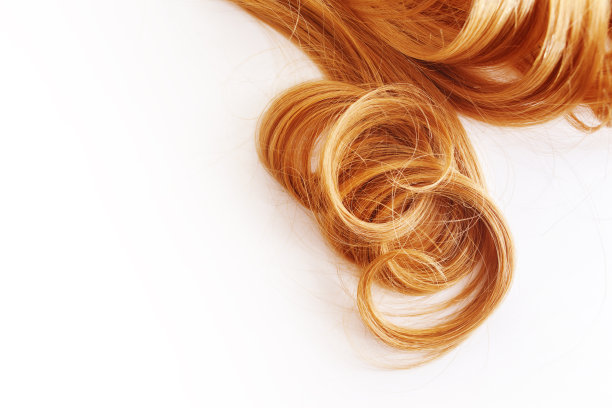 金发孤立在白色背景上。一缕淡或红的头发,护发图片 金发孤立在白色背景上。一缕淡或红的头发,护发图片下载