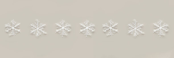 白色的雪花在灰色的背景上。图片 白色的雪花在灰色的背景上。图片下载