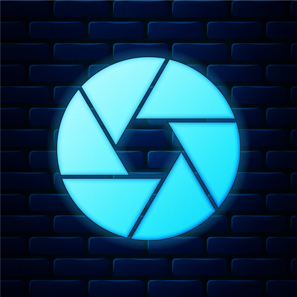 发光的霓虹灯相机快门图标孤立在砖块上图片 发光的霓虹灯相机快门图标孤立在砖块上图片下载