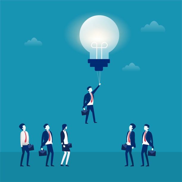 商人紧紧抓住飞亮的灯泡图片 商人紧紧抓住飞亮的灯泡图片下载