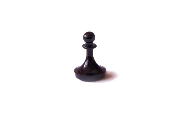 棋子。孤立在白色背景上的一枚黑卒图片 棋子。孤立在白色背景上的一枚黑卒图片下载