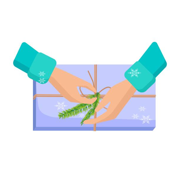 节礼日。手拿着礼物。圣诞节准备一份礼物。图片 节礼日。手拿着礼物。圣诞节准备一份礼物。图片下载