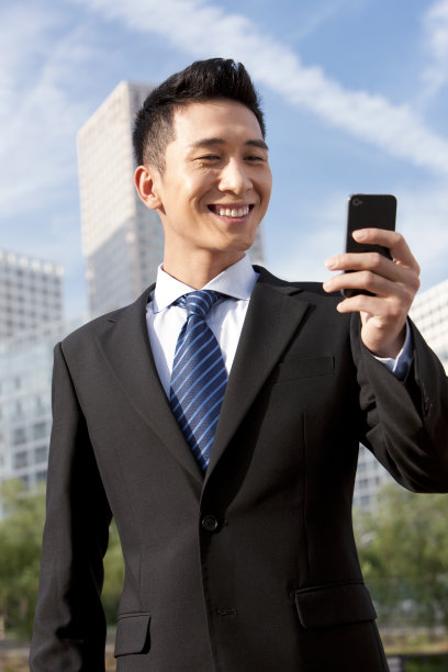 商务人士用手机图片 商务人士用手机图片下载