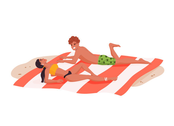年轻的男女在沙滩上晒日光浴图片 年轻的男女在沙滩上晒日光浴图片下载