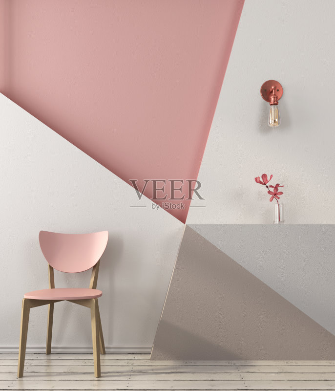 几何墙背景上的粉红色椅子正版图片素材