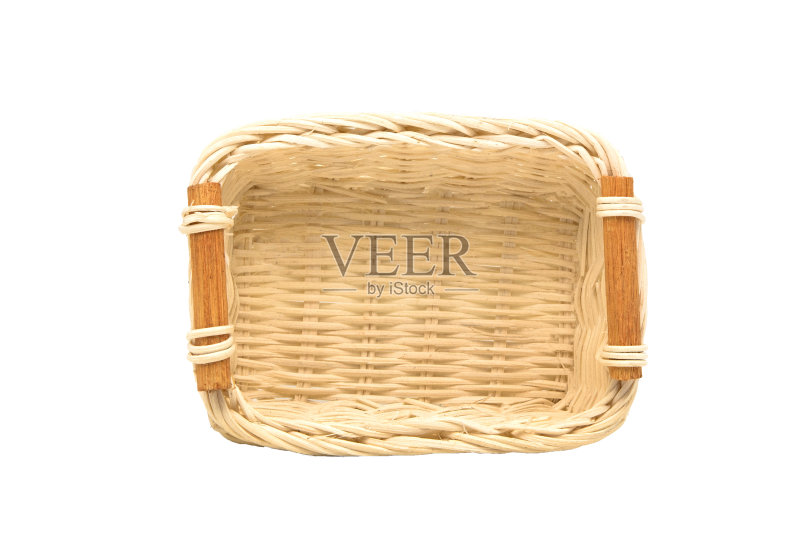 空柳条篮子,木水果或面包篮子在白色的背景在顶视图正版图片素材